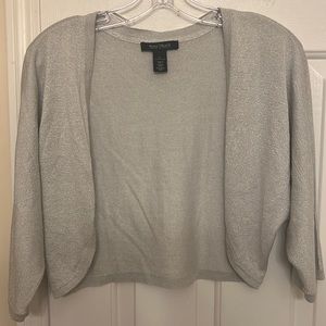 A silver sweater